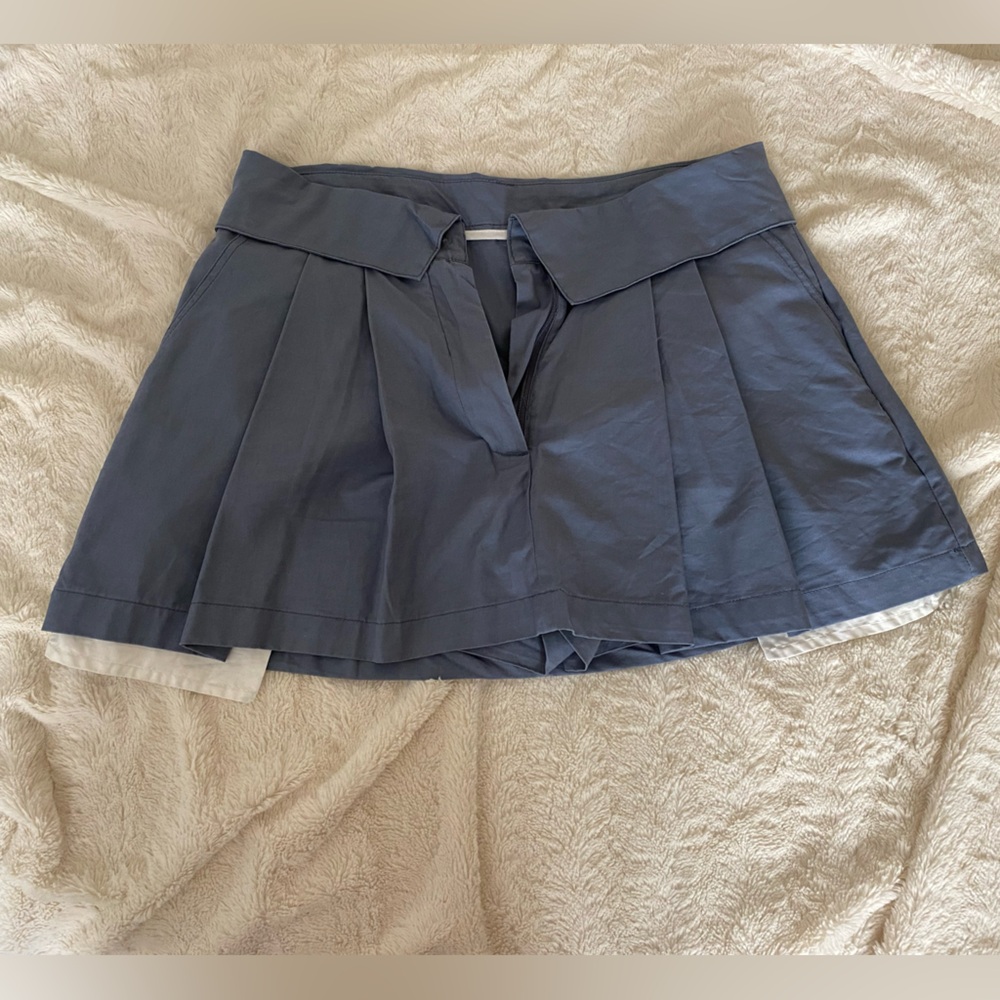 Menswear pleated mini skirt with fold over waist